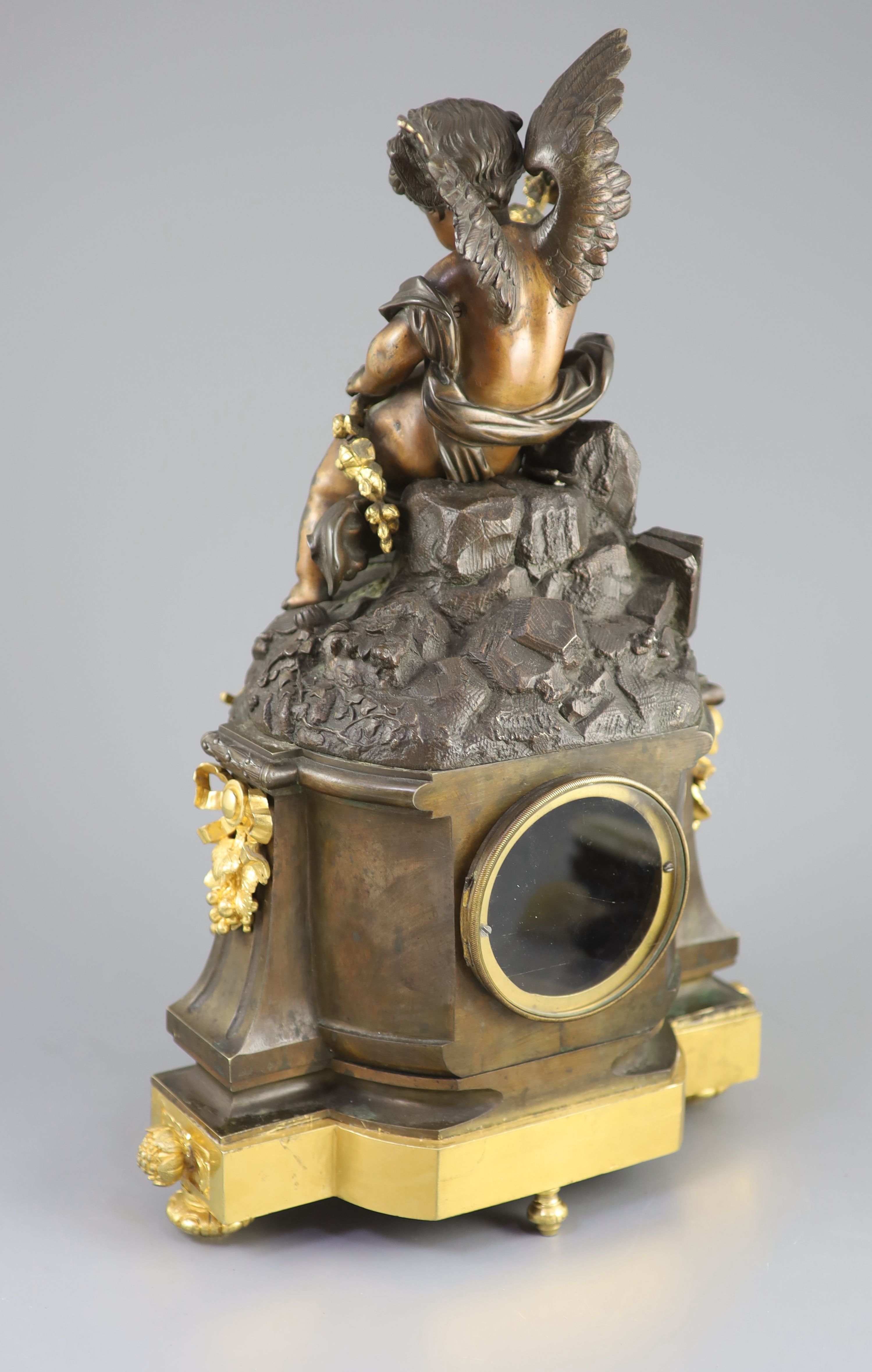 A large French figural bronze and ormolu mantel clock, 19th century 46cm high.